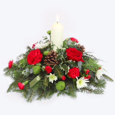 Yuletide Glow - A Christmas candle arrangement, perfect for the festive table, handmade using favourite Christmas flowers and foliage.
